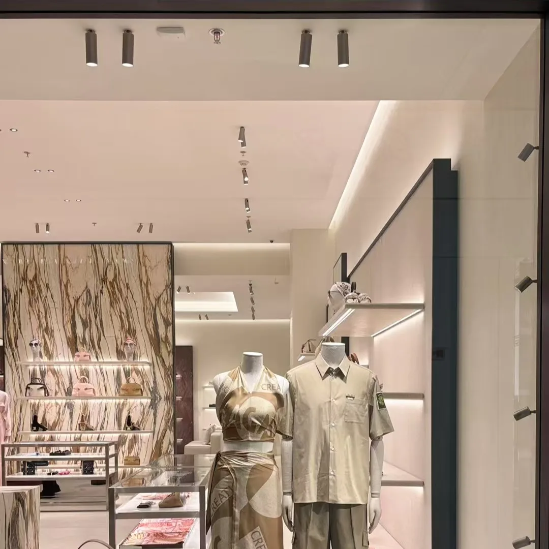 Luxury fashion boutiques require lighting that enhances products without overwhelming the space. This solution combines compact magnetic track lighting with precise accent illumination to highlight merchandise, create visual hierarchy and maintain a refined architectural atmosphere.