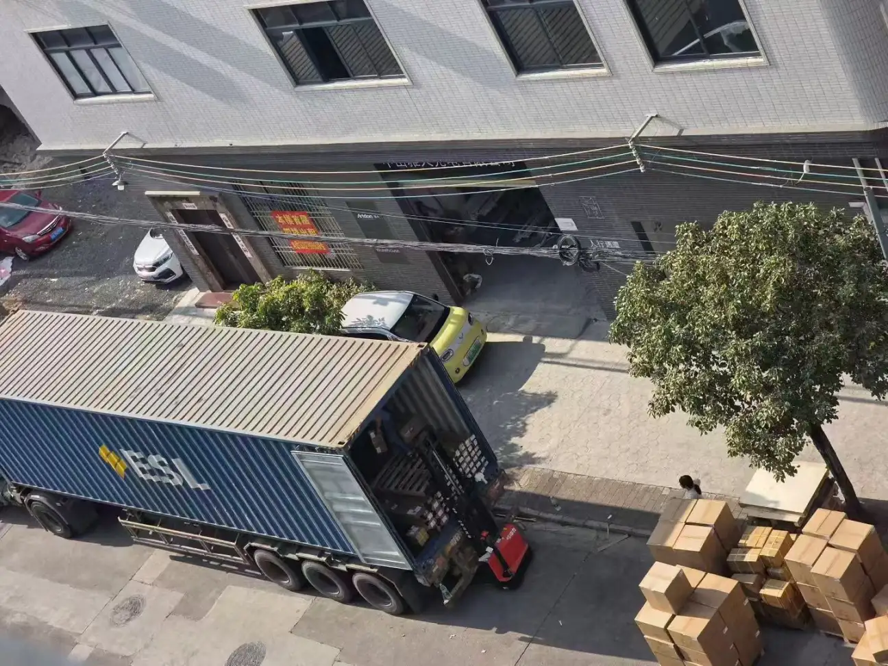 Container loading and international shipment preparation for architectural lighting products at Artdon Lighting.
