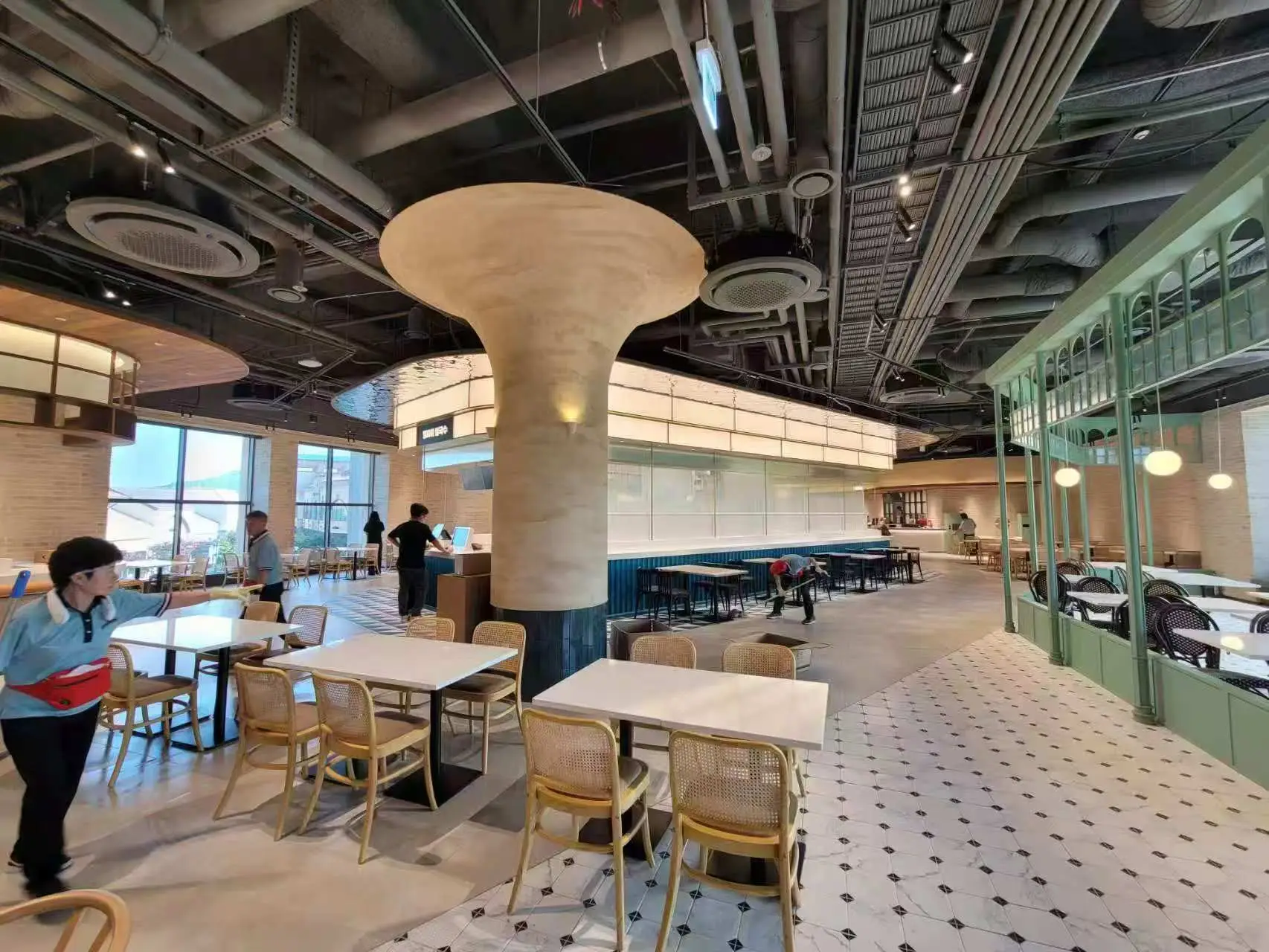the exposed ceiling design illuminated by SPECTRUM Track Lights and SOFT Recessed Downlights.