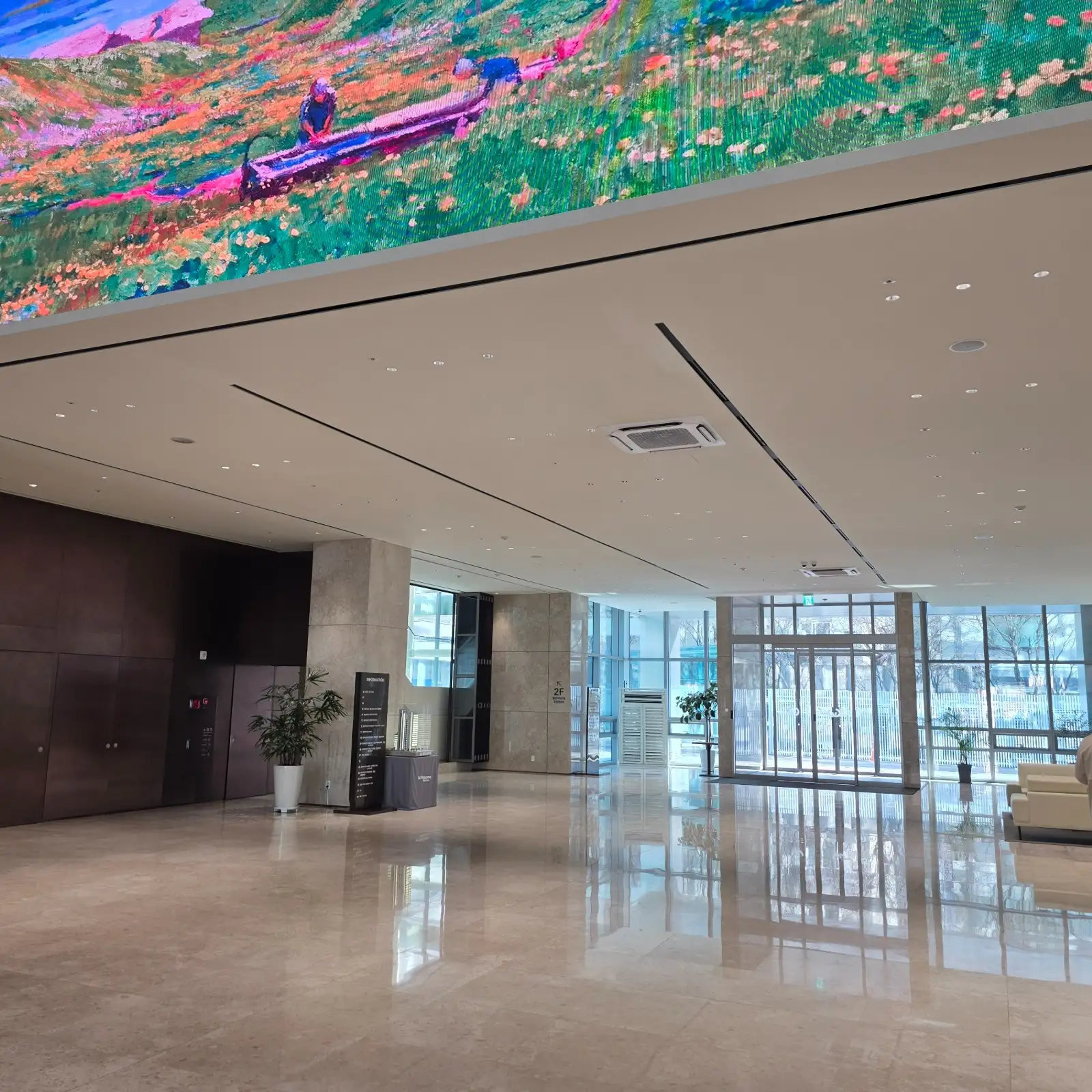 SLIM recessed downlights in a modern commercial lobby