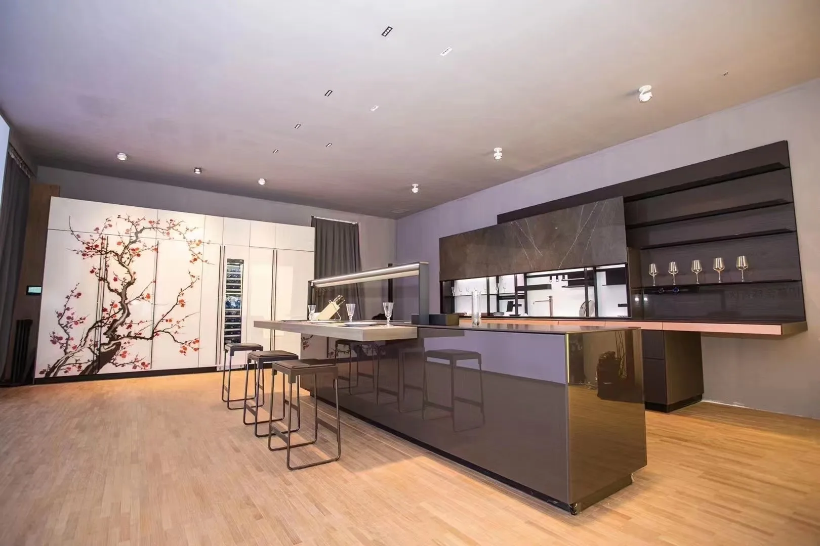 Modern office meeting and pantry area illuminated by FLEXI and LITE PRO recessed downlights.