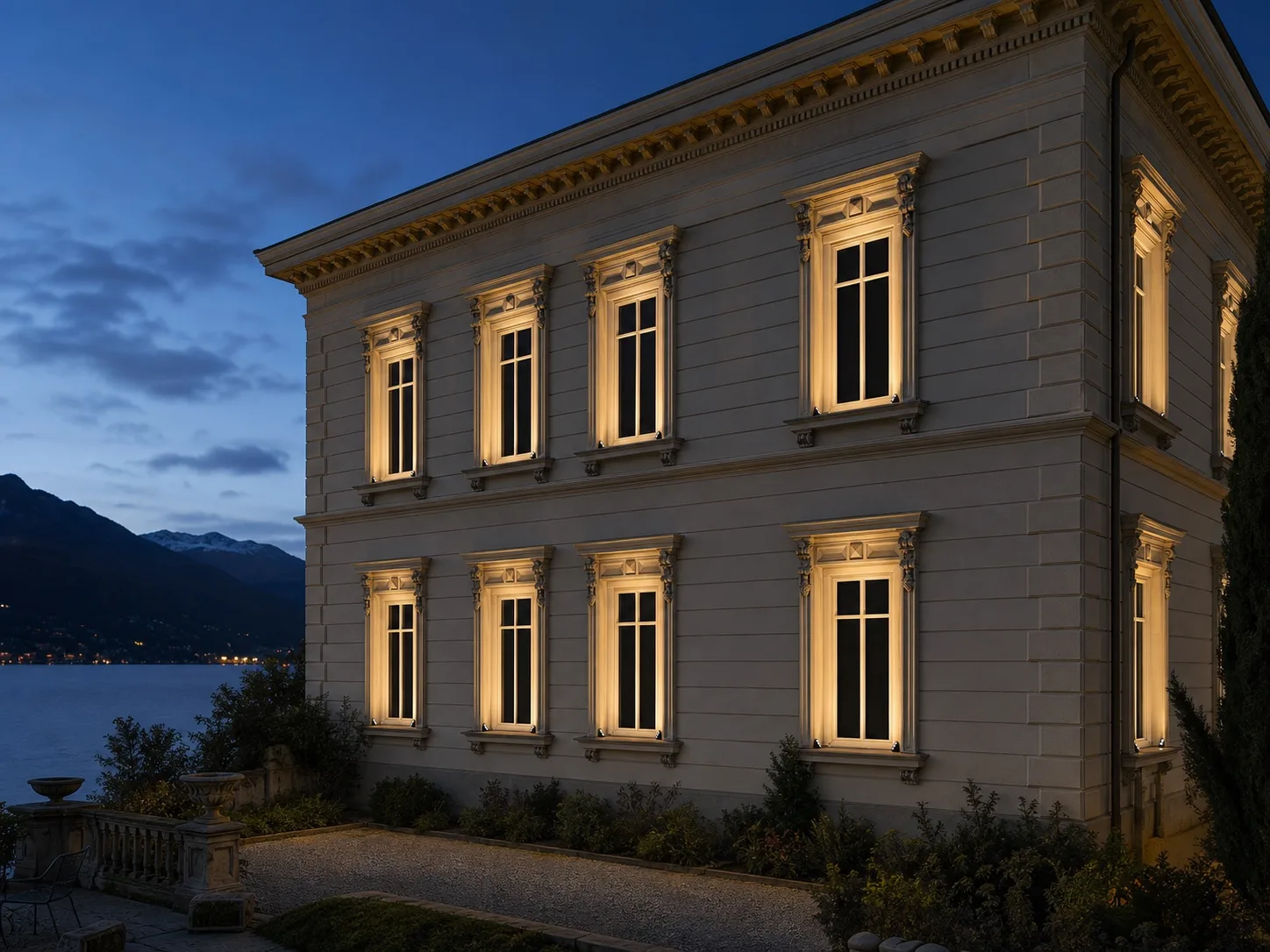 Paired WINDOW LIGHT luminaires creating symmetrical illuminated windows across a Lake Como villa facade