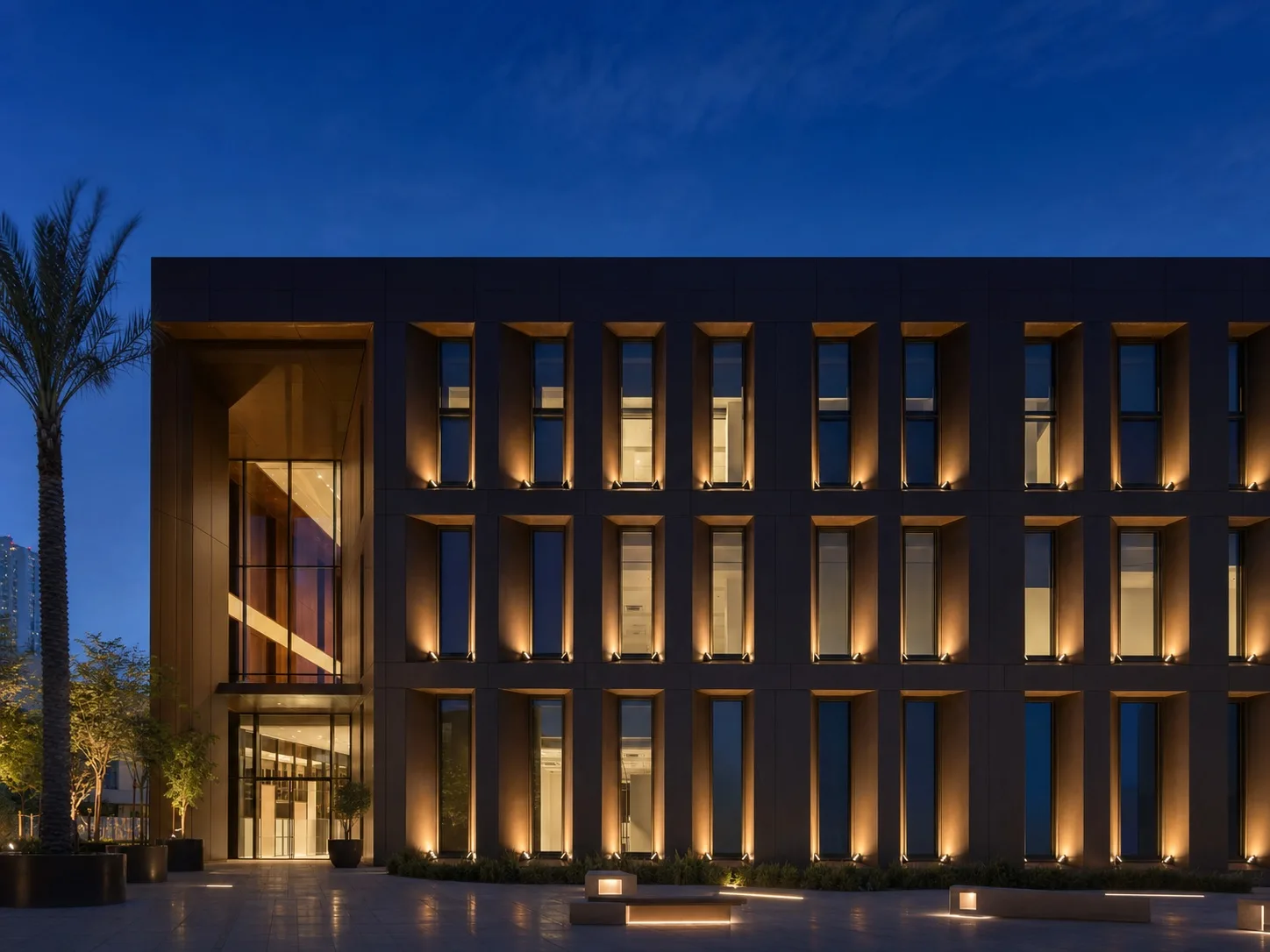 Paired WINDOW LIGHT fixtures illuminating deep window reveals on a contemporary Dubai cultural centre